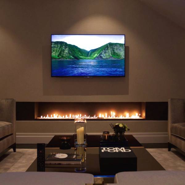 Как разместить биокамин под телевизор